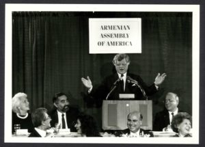 Sen. Edward Kennedy spoke at the 1987 Armenian Assembly National Conference and Tribute Gala in Boston. Also pictured in the photo, seated from left to right, former First Lady Barbara Bush, Assembly Board of Trustees Chairman Hirair Hovnanian and Assembly Board of Directors Chairman Jirair Haratunian.