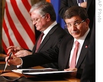 Turkey’s Foreign Minister, Ahmet Davutoglu, foreground, with Foreign Minister Eduard Nalbandian