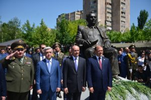 The president and his delegation in front of Babajanyan's statue