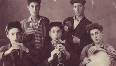 Seated at the center, with fellow musicians, in 1944 at age 16.